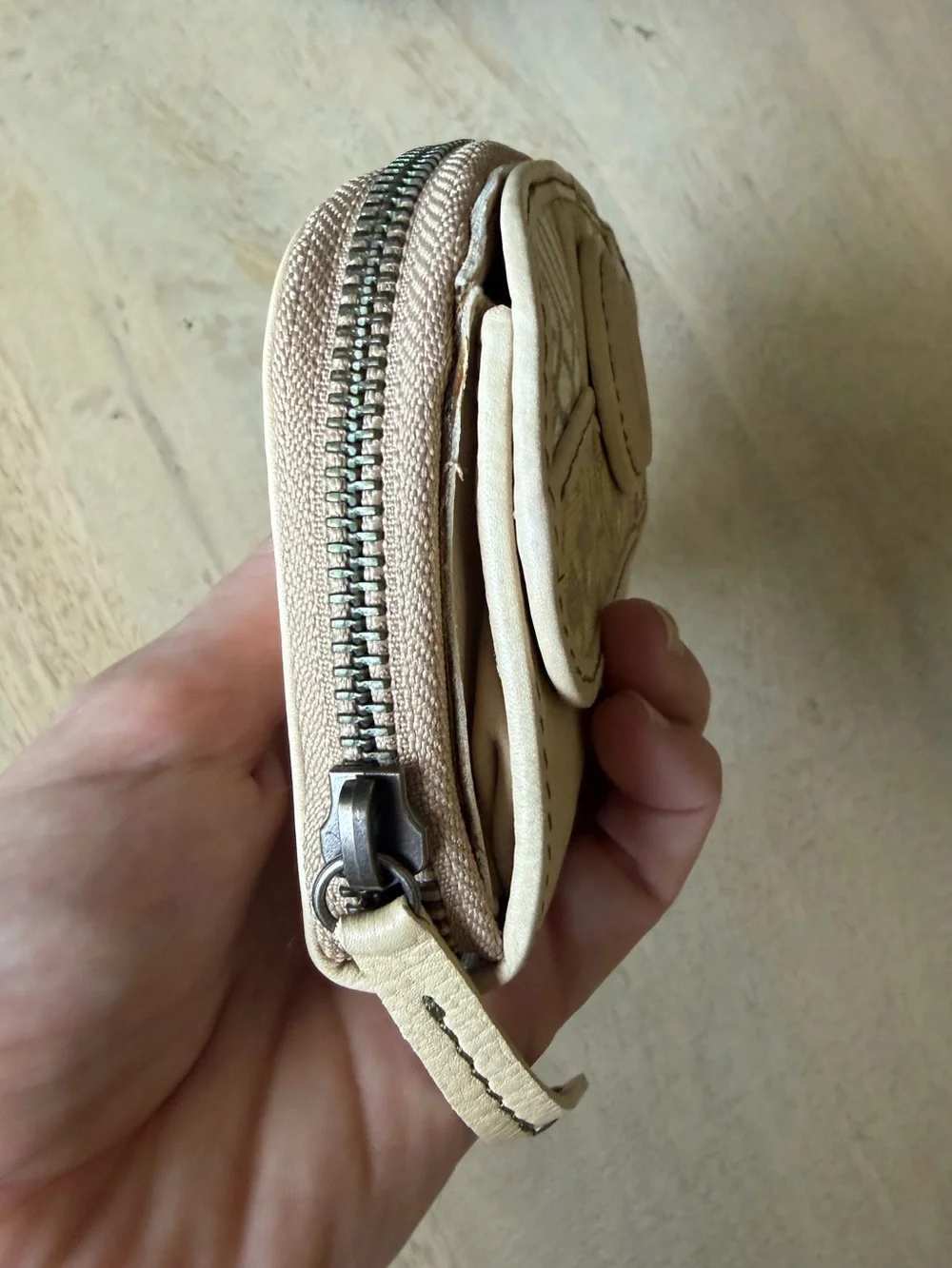 Fossil brand light Beige Patchwork Leather zip around Wallet with Button detail